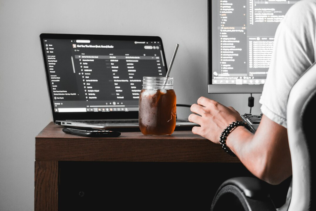 beginner programmer at desk