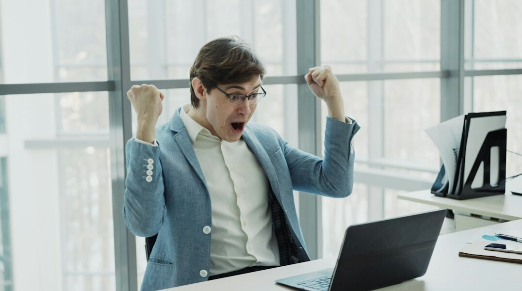 successful programmer celebrating