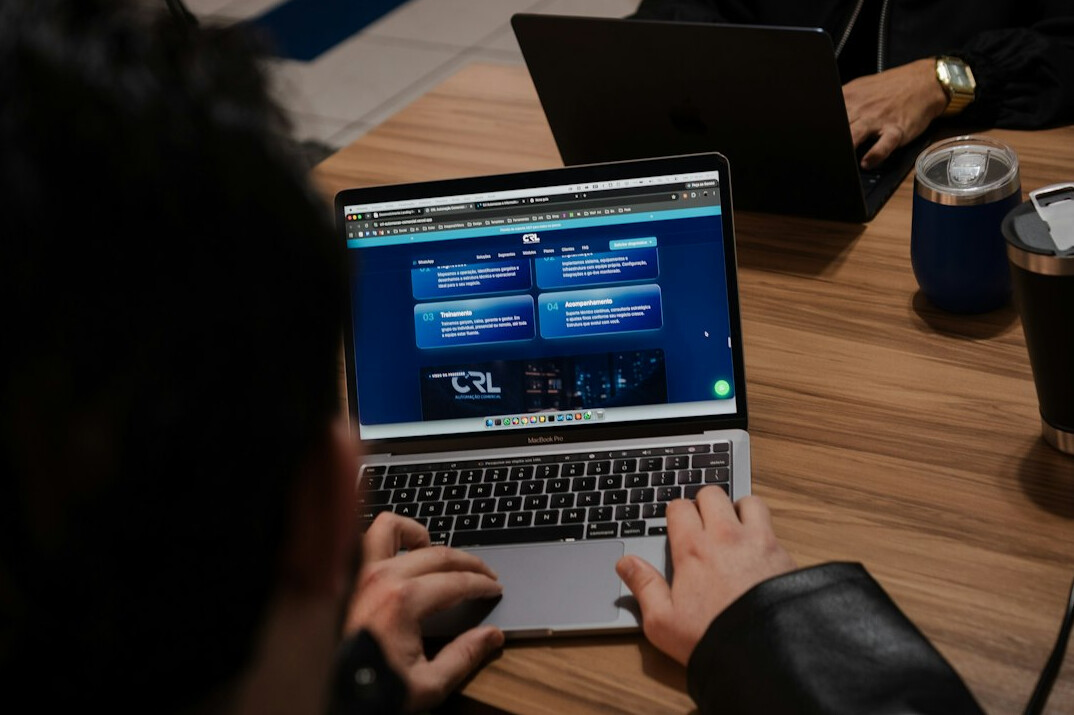 person learning to code on laptop